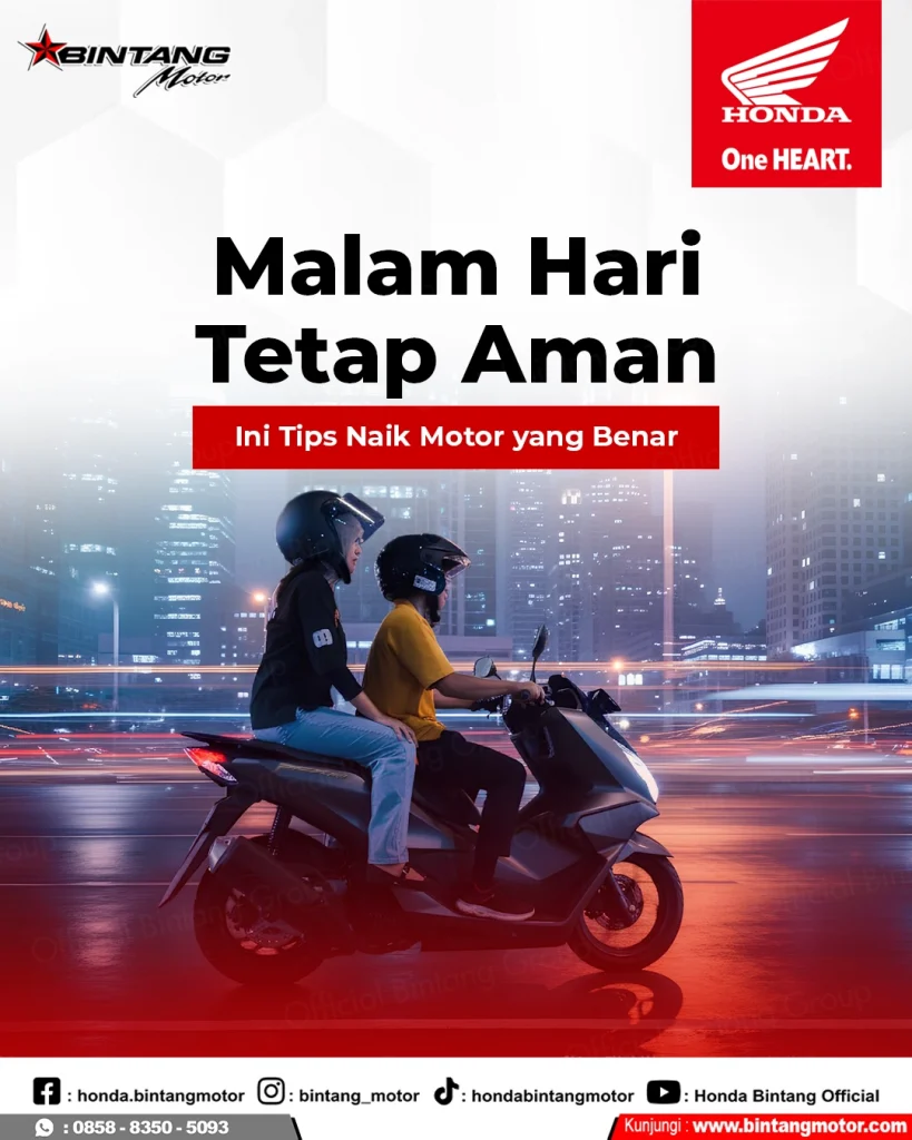 Pengendara motor Honda berkendara aman di malam hari dengan perlengkapan lengkap